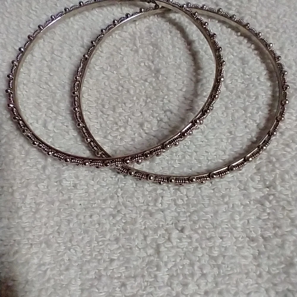 Set of 2 bangle bracelets approx. 2.5 wide.